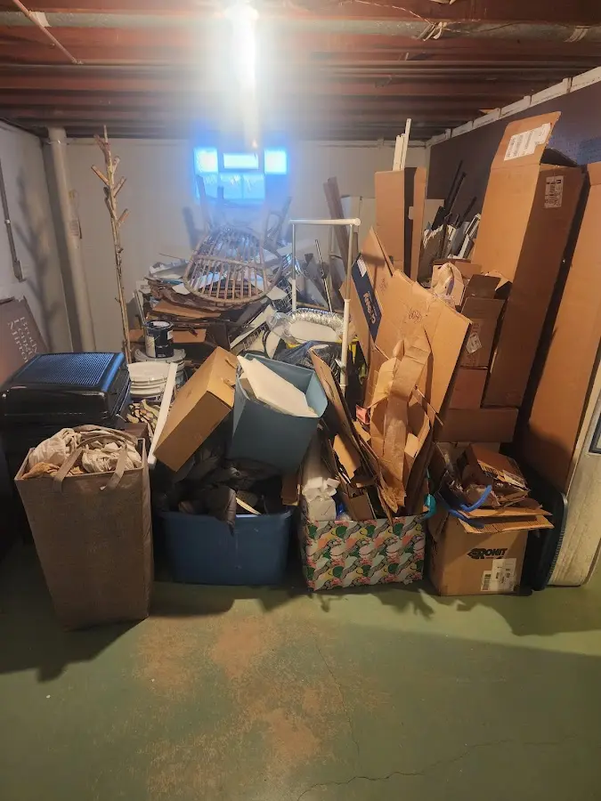 Roll-off dumpster container at job site for 6 Yard Dumpster Rental in Lake Tapps